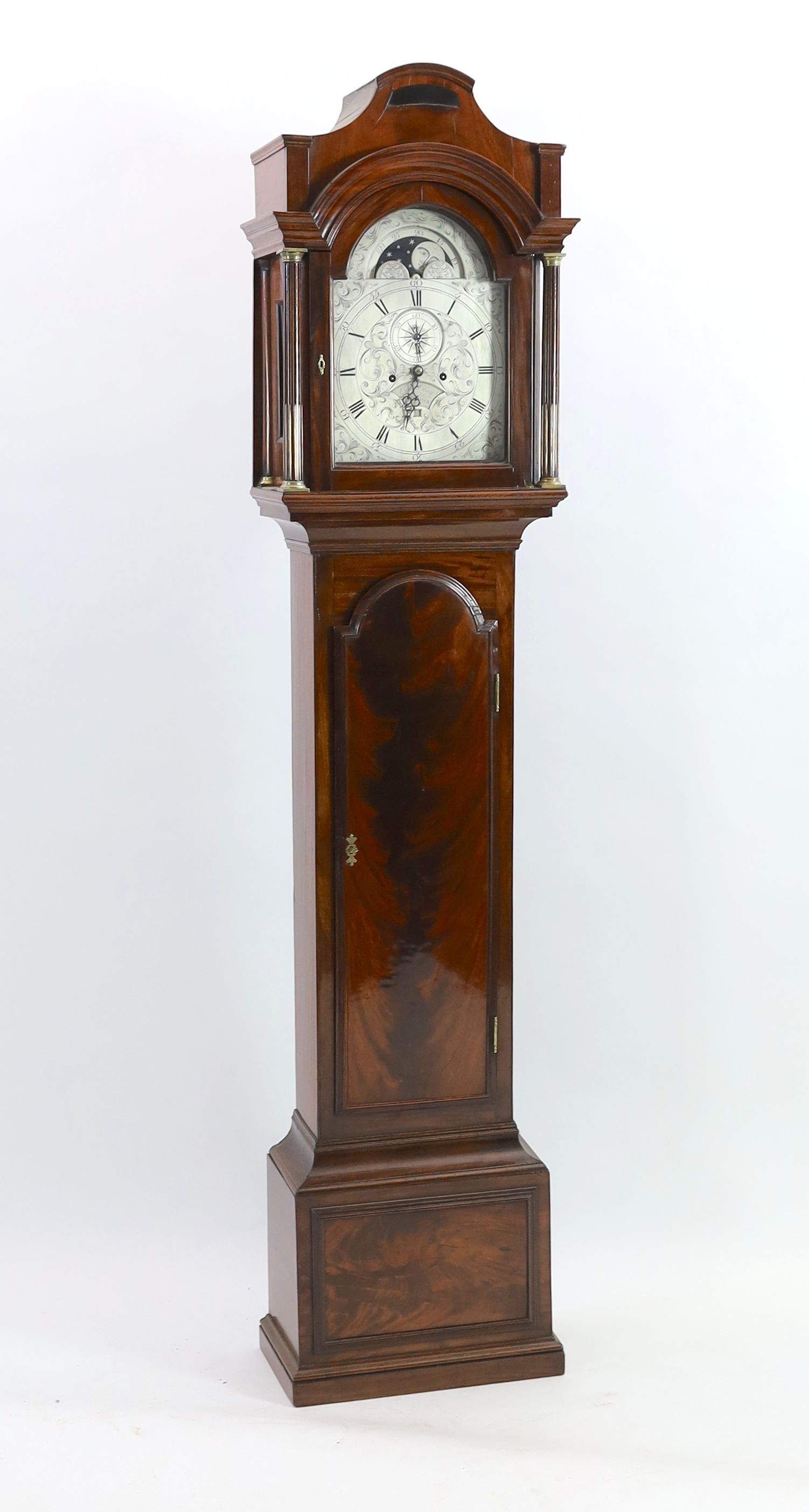 A George III mahogany cased eight day longcase clock, by Charles Clay, London, the 30cm arched silvered dial with moonphase, subsidiary seconds and calendar aperture, height 224cm